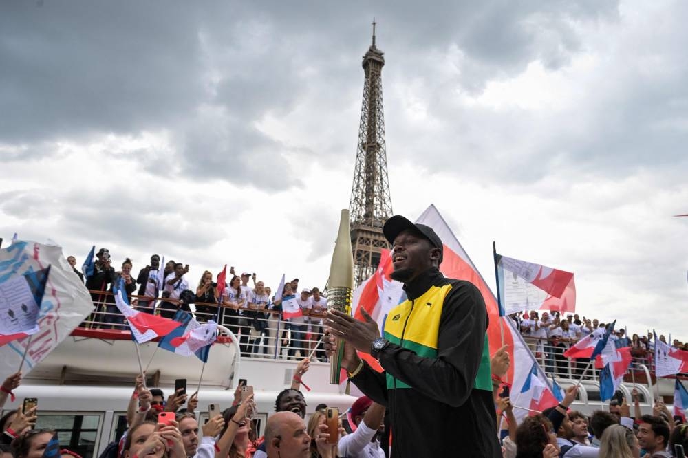 Bolt unveils Paris 2024 torch for next Olympic and Paralympic Games